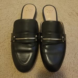 Black mules with silver accent